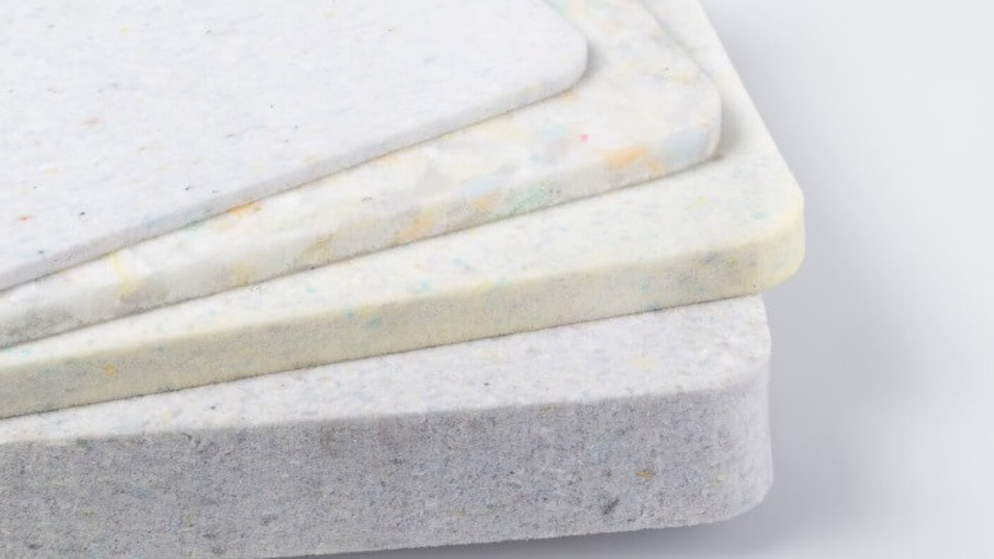 Composite materials are manufactured on the basis of recycled foam scraps and are characterised by excellent insulation and absorption properties